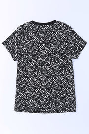 Black spotted print crew neck t-shirt with short sleeves.