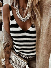 Relaxed black and white striped V-neck knit tank top with a shell necklace.