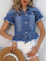 Blue denim trucker jacket with ruffled hem, pearl buttons, and short sleeves.