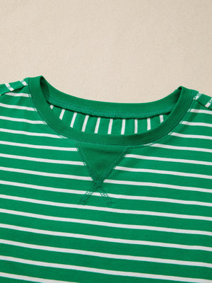 Green and white striped cotton t-shirt with crew neck and contrast stitching detail.