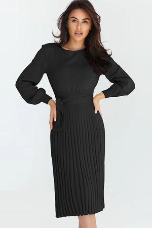 Black belted pleated knit midi dress with long balloon sleeves and a tie waist.