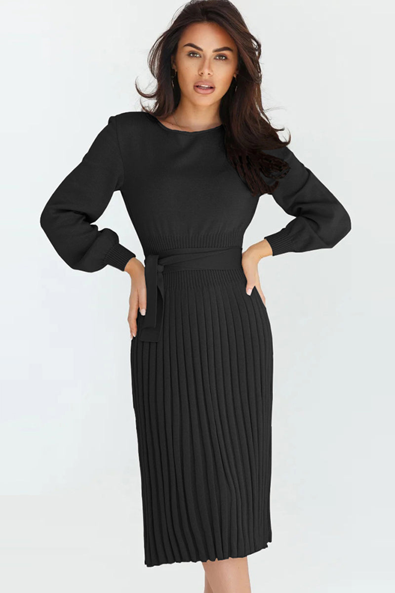 Black belted pleated knit midi dress with long balloon sleeves and a tie waist.
