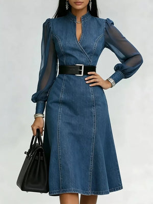 Denim midi dress with sheer puff sleeves, V-neck, and flared skirt.