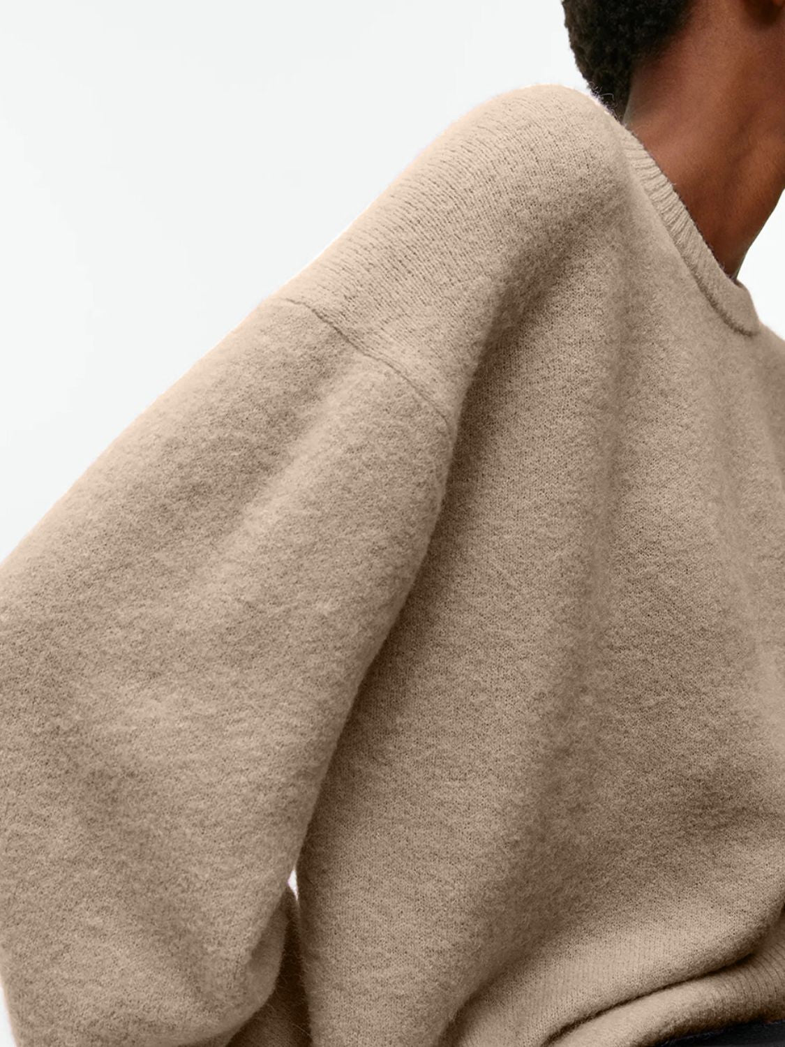 Oversized crewneck sweater in Tan brushed knit with relaxed sleeves.