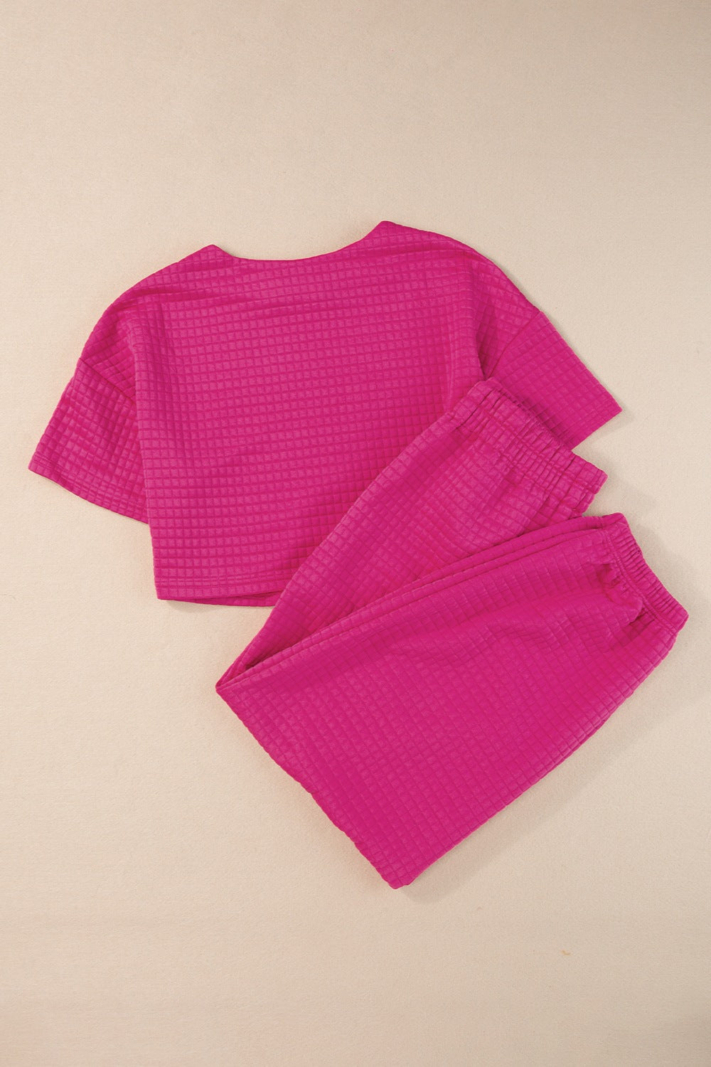 Hot Pink quilted knit crop top and jogger set with textured waffle pattern.