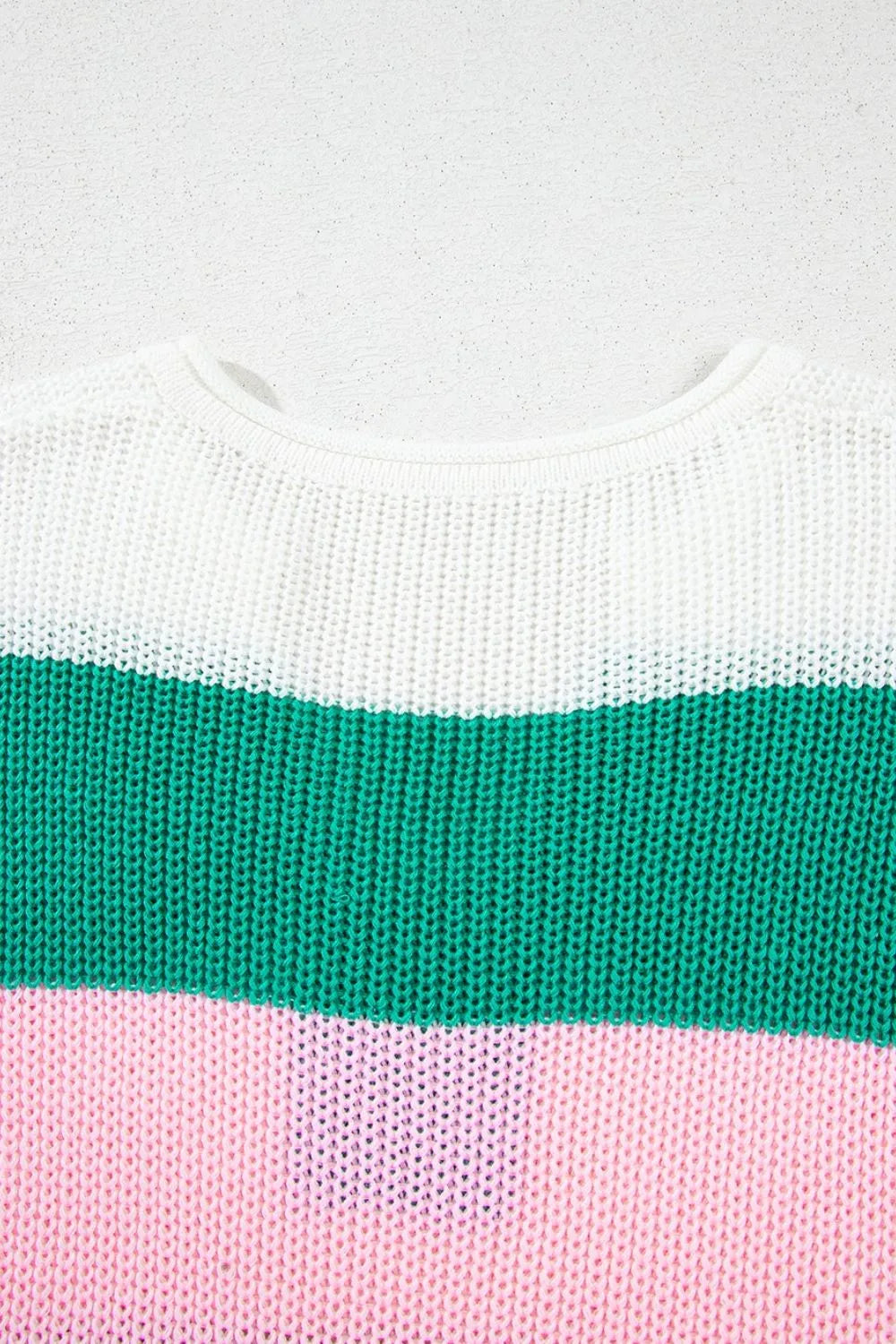 Colorblock knit tee with white, green, and pink stripes and a crew neck.