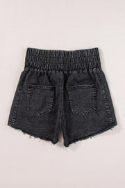 Black washed denim shorts with elastic waist and frayed hem