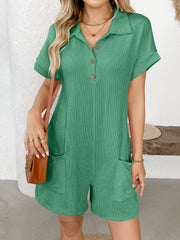 Green ribbed knit romper with white pinstripes, patch pockets, and button-up collar