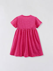 Pink cotton baby dress with scattered polka dots, crew neck, short sleeves, and gathered skirt.