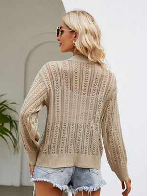 Khaki open knit cardigan with ribbed trim and long sleeves.