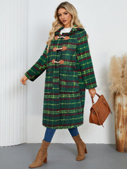 Tartan toggle hooded coat in dark green with brown toggles and leather trim.