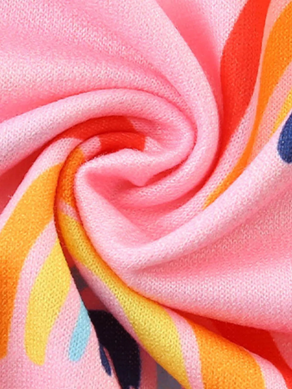Toddler dress in pink cotton blend with a colorful rainbow stripe print.