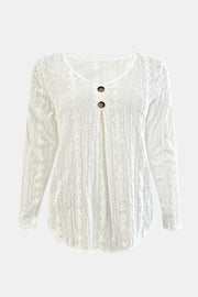 White textured diamond-stitch button-down blouse with long sleeves and a V-neck.
