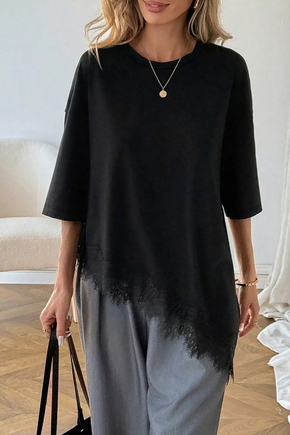 Lace Asymmetrical Hem Round Neck T-shirt in Black, front view