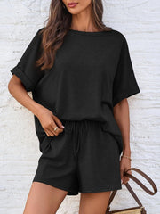 Black relaxed fit tee with cuffed sleeves and drawstring shorts set