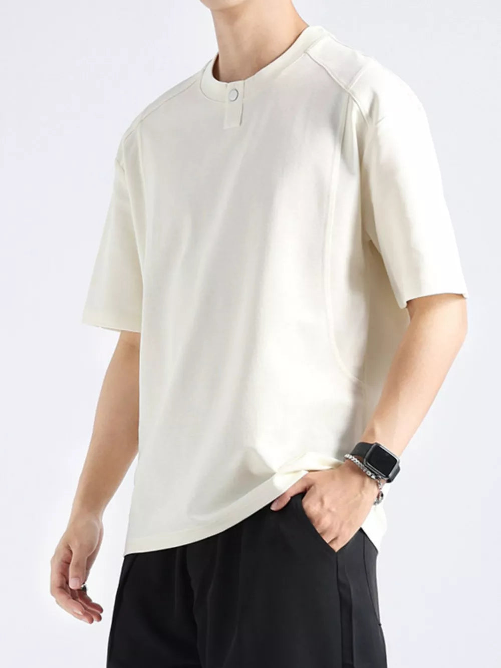 Men's apricot cotton short sleeve tee with button detail at neckline