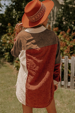 Colorblock corduroy shacket with oversized patchwork in brown, rust, and cream.