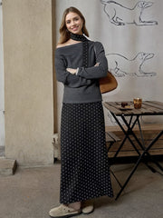 One shoulder grey top with polka dot scarf and black polka dot maxi skirt