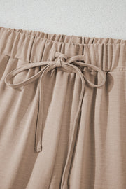 Camel drawstring palazzo pants with elastic waistband and tie detail