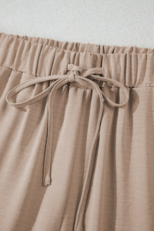 Camel drawstring palazzo pants with elastic waistband and tie detail