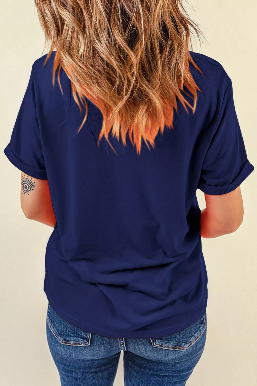Navy blue patriotic graphic relaxed t-shirt with cuffed short sleeves and a crew neck.
