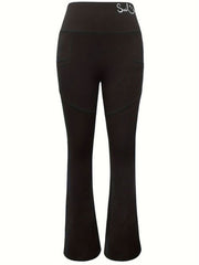 Black bootcut leggings with smile detail on waistband and pocket accents