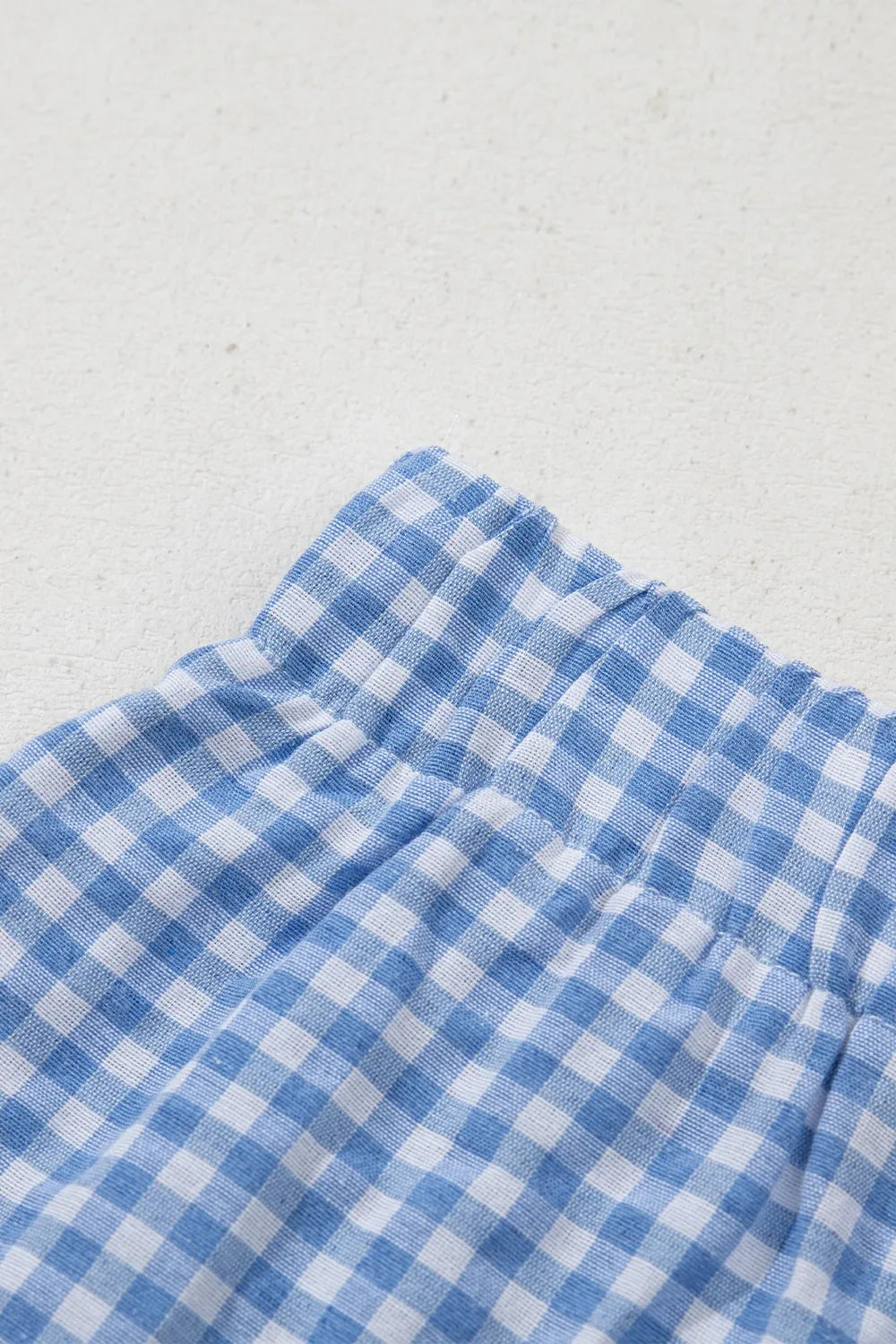 Light blue gingham boxer shorts with elastic waistband detail