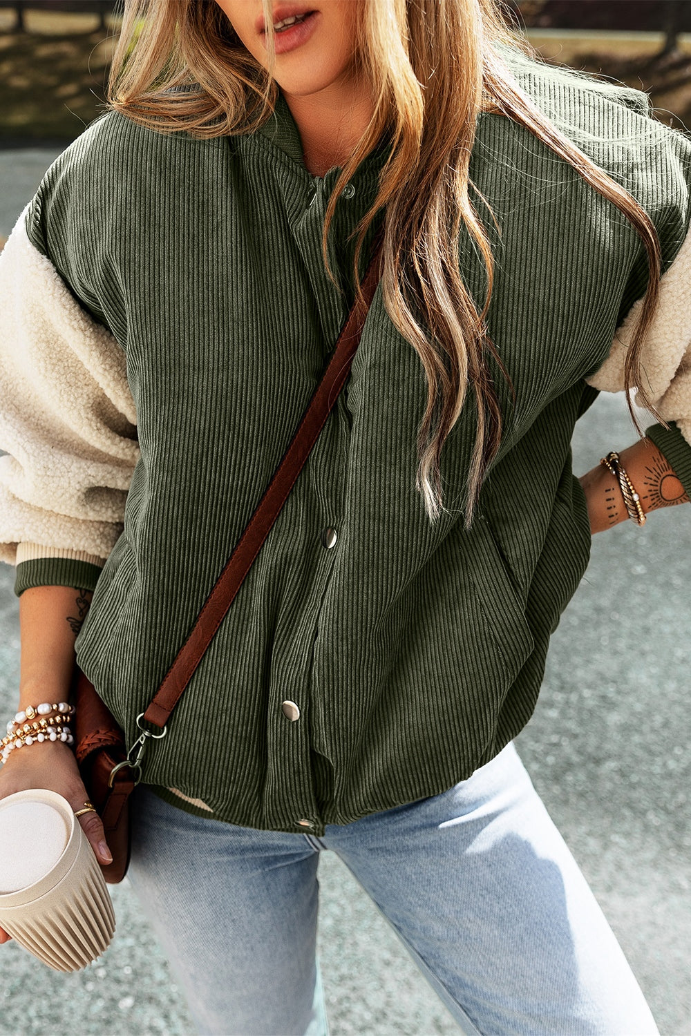 Moss corduroy bomber jacket with sherpa sleeves and contrast trim.