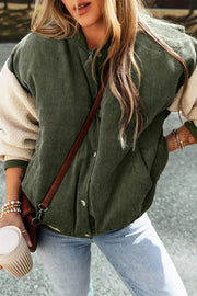 Moss corduroy bomber jacket with sherpa sleeves and contrast trim.