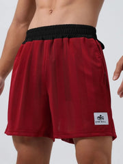 Deep red performance mesh training shorts with vertical stripes and black waistband.