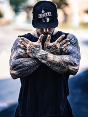 Black sleeveless tank top with a crew neck, worn by a tattooed man.