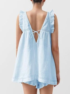 Light blue ruffled V-neck top and shorts set with lace trim and tie back.