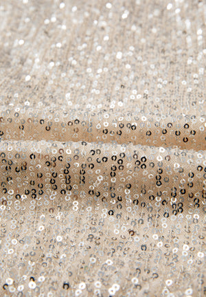 Sequin wrap bodysuit in ivory with a deep V-neck and all-over sparkle.