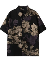 Men's black oversized short sleeve shirt with a muted floral print.