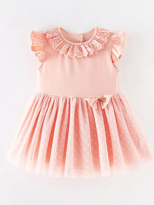 Pink baby girl dress with ruffled collar, cap sleeves, polka dot tulle skirt, and bow detail.