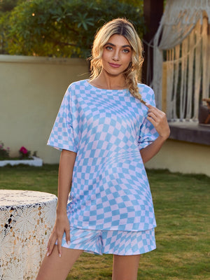 Light blue checkerboard slouchy lounge set with short sleeves and shorts.