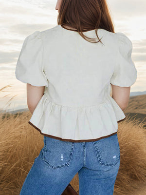 Tied puff sleeve peplum blouse in white with brown trim, 100% polyester