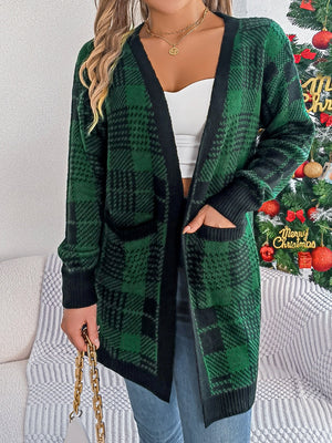 Plaid knit longline cardigan in dark green with black trim and pockets.