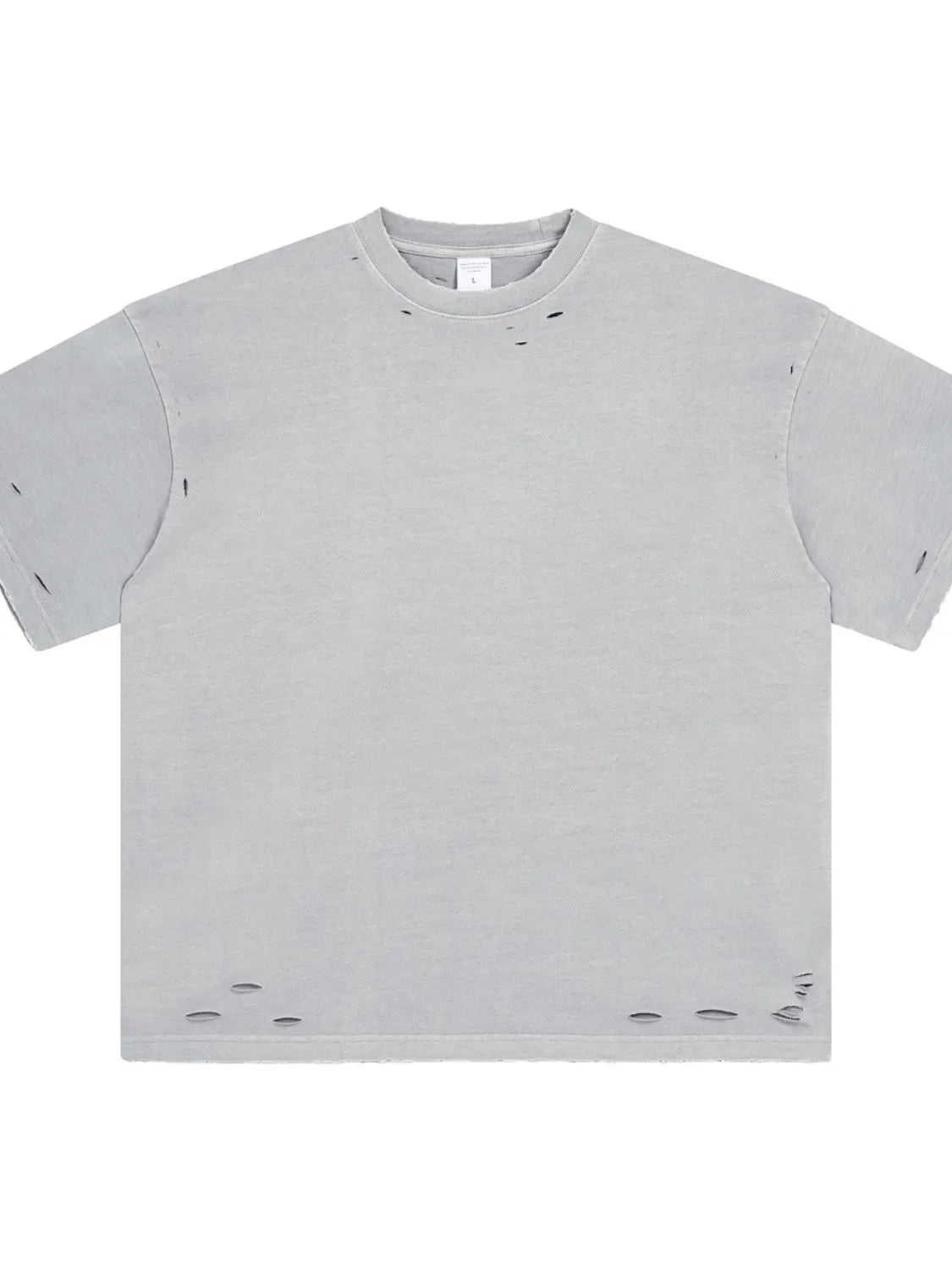 Distressed oversized gray cotton t-shirt with raw hem and ripped details.