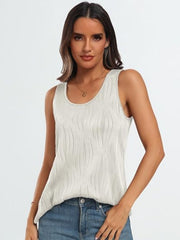 White textured wave tank top with scoop neck, casually styled with jeans.