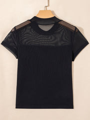 Black sheer mesh cap sleeve t-shirt with mock neck and ribbed body.