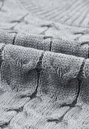 Gray cable knit turtleneck capelet sweater with acrylic material.