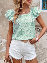 Green floral ruffle blouse with square neckline and short flutter sleeves.
