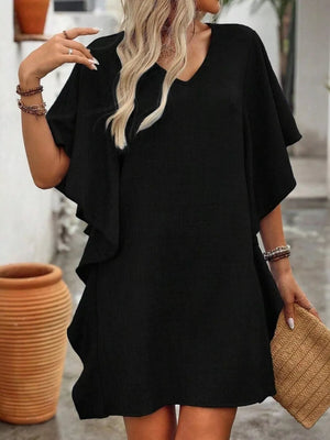 Black mini dress with v-neck and ruffled flutter sleeves.