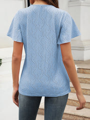 Light blue eyelet blouse with flutter sleeves and a V-neck, shown from the back.