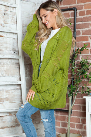Open-knit slouchy cardigan in matcha green with a relaxed fit and open front.