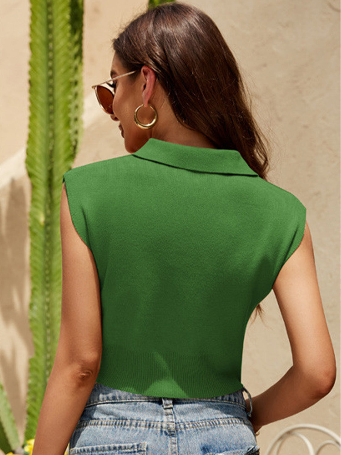 Green cropped polo knit tank top with collar and cap sleeves.