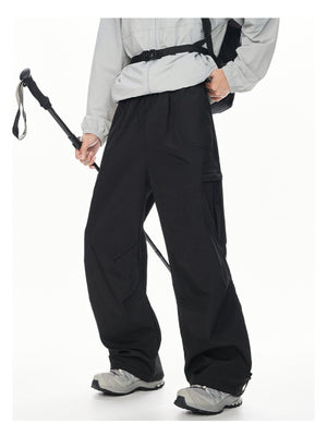 Men's black relaxed fit cargo sweatpants with adjustable drawstring waist and ankle cuffs.