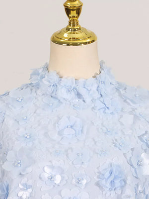 Blue ruffled floral applique mini dress with pearl accents
