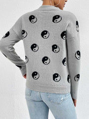 Heather gray drop shoulder knit sweater with all-over black yin yang pattern.